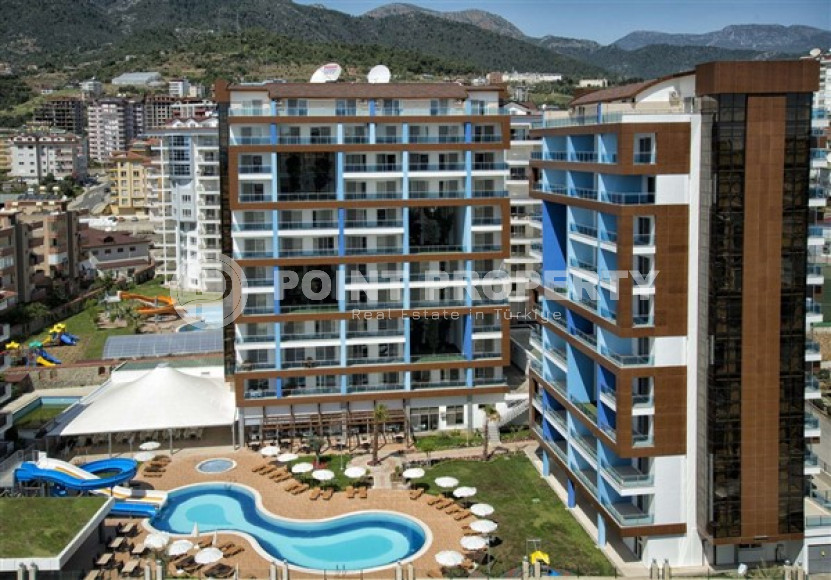 A small furnished 1+1 apartment in a luxury residential complex with the most developed leisure infrastructure. Description:-id-4116-photo-7