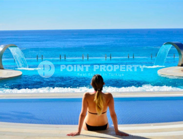 Просторные апартаменты 1+1 площадью 75 м2 с видом на море в элитном комплексе в районе Конаклы, 700 м от моря-id-1341-фото-1