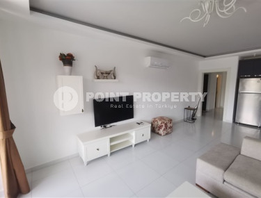 Spacious one-bedroom apartment with modern design 700 meters from the sea in the beautiful, quiet area of Kargicak.-id-4118-photo-1
