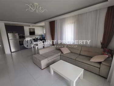 Spacious one-bedroom apartment with modern design 700 meters from the sea in the beautiful, quiet area of Kargicak.-id-4118-photo-2