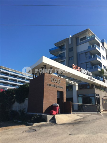 Просторная двухкомнатная квартира с современным дизайном в 700 метрах от моря в прекрасном спокойном районе Каргыджак.-id-4118-фото-12