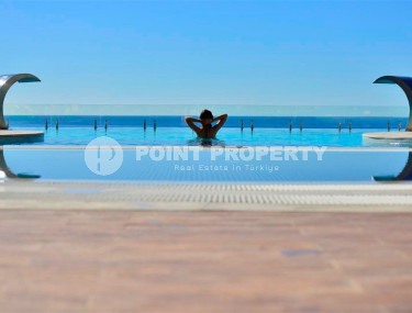 Просторные апартаменты 1+1 площадью 75 м2 с видом на море в элитном комплексе в районе Конаклы, 700 м от моря-id-1341-фото-3