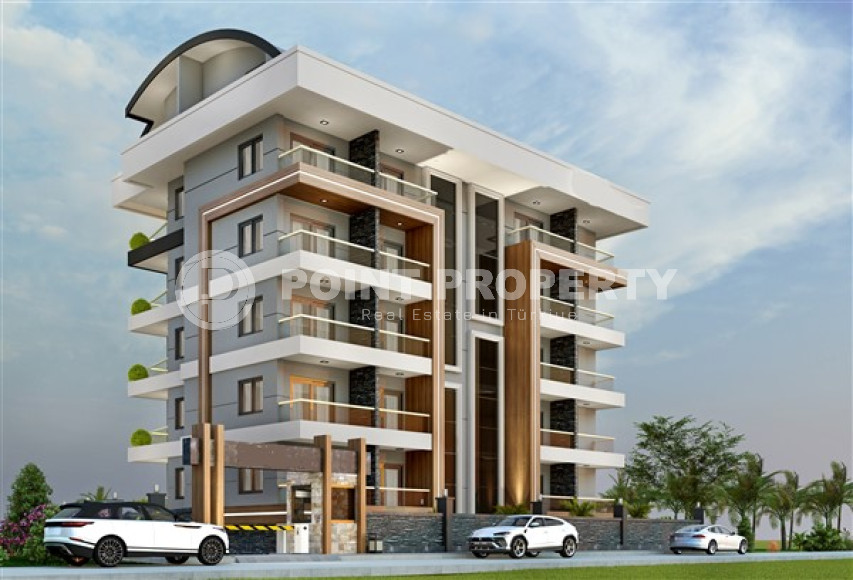 Small new apartment 1+1, with a total area of 54 m2, 500 meters from the sea in the popular Mahmutlar area.-id-4120-photo-2