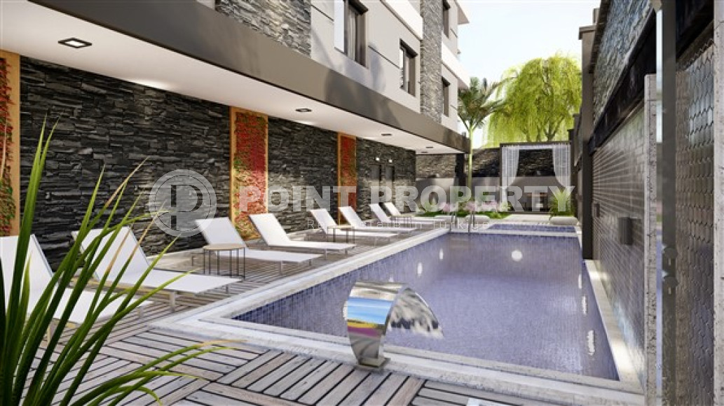 Small new apartment 1+1, with a total area of 54 m2, 500 meters from the sea in the popular Mahmutlar area.-id-4120-photo-6