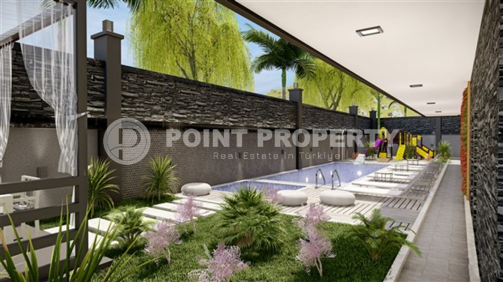 Small new apartment 1+1, with a total area of 54 m2, 500 meters from the sea in the popular Mahmutlar area.-id-4120-photo-7