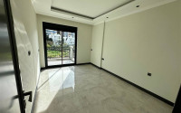 New 1+1 apartment with fine finishing in a luxury residential complex in the comfortable Kargicak area.-id-4121-photo-4