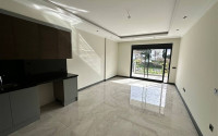 New 1+1 apartment with fine finishing in a luxury residential complex in the comfortable Kargicak area.-id-4121-photo-1