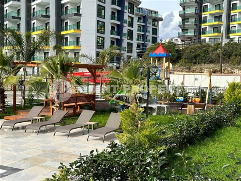 New 1+1 apartment with fine finishing in a luxury residential complex in the comfortable Kargicak area.-id-4121-photo-10