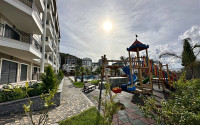 New 1+1 apartment with fine finishing in a luxury residential complex in the comfortable Kargicak area.-id-4121-photo-13