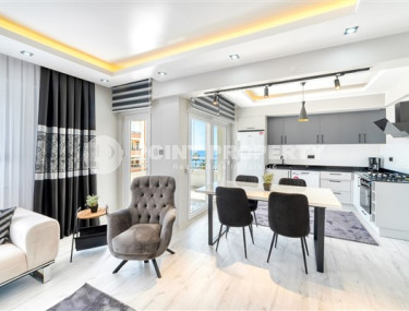 Stylish 3+1 apartment with designer renovation 50 meters from the beach and promenade in the popular Mahmutlar area.-id-4126-photo-2