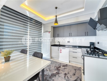 Stylish 3+1 apartment with designer renovation 50 meters from the beach and promenade in the popular Mahmutlar area.-id-4126-photo-4