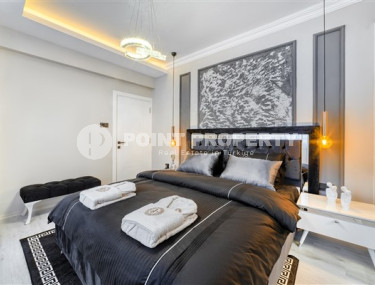 Stylish 3+1 apartment with designer renovation 50 meters from the beach and promenade in the popular Mahmutlar area.-id-4126-photo-5
