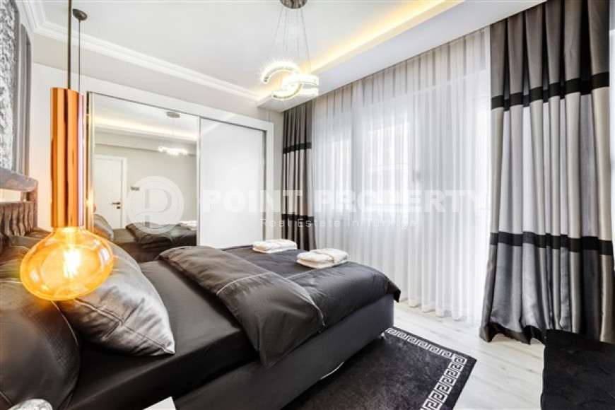 Стильная квартира 3+1 с дизайнерским ремонтом в 50 метрах от пляжа и набережной в популярном районе Махмутлар.-id-4126-фото-6