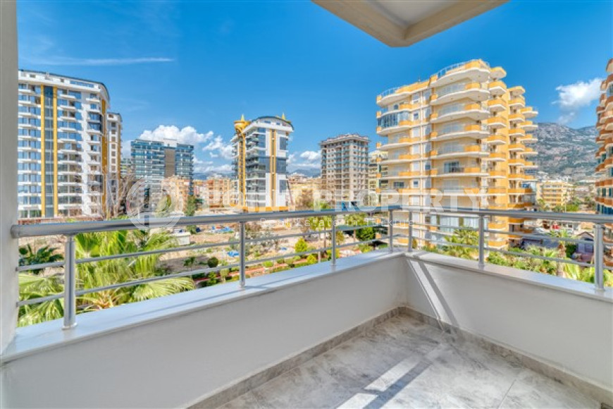 Стильная квартира 3+1 с дизайнерским ремонтом в 50 метрах от пляжа и набережной в популярном районе Махмутлар.-id-4126-фото-14