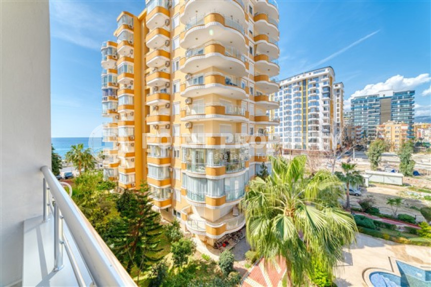 Стильная квартира 3+1 с дизайнерским ремонтом в 50 метрах от пляжа и набережной в популярном районе Махмутлар.-id-4126-фото-16