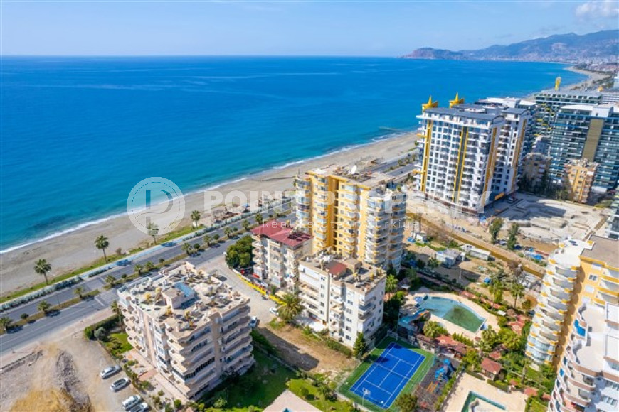 Стильная квартира 3+1 с дизайнерским ремонтом в 50 метрах от пляжа и набережной в популярном районе Махмутлар.-id-4126-фото-18