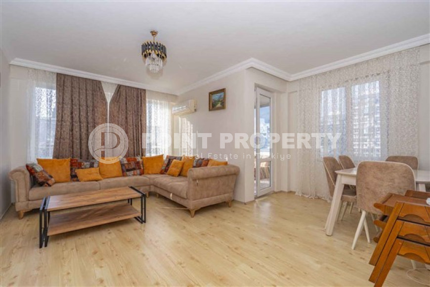 Spacious three-bedroom apartment on the 7th floor in the center of Mahmutlar.-id-4130-photo-1