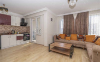 Spacious three-bedroom apartment on the 7th floor in the center of Mahmutlar.-id-4130-photo-2
