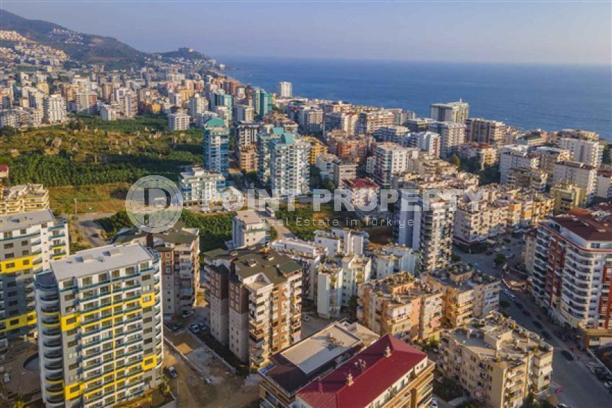 Spacious three-bedroom apartment on the 7th floor in the center of Mahmutlar.-id-4130-photo-12