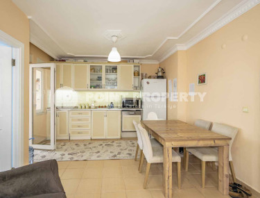 Apartment 4+1 on the 1st floor in a house built in 2008 in the center of the modern Mahmutlar district.-id-4131-photo-2