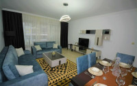 Spacious furnished two-bedroom apartment in the center of Mahmutlar.-id-4133-photo-2