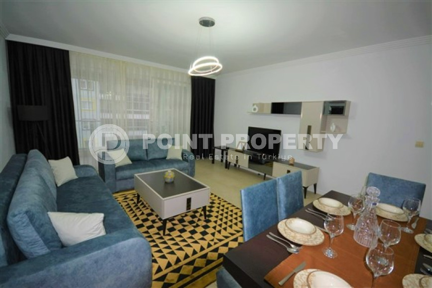 Spacious furnished two-bedroom apartment in the center of Mahmutlar.-id-4133-photo-2