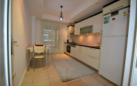 Spacious furnished two-bedroom apartment in the center of Mahmutlar.-id-4133-photo-3