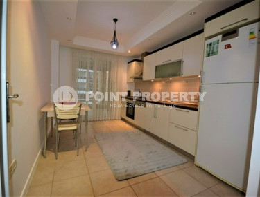 Spacious furnished two-bedroom apartment in the center of Mahmutlar.-id-4133-photo-3