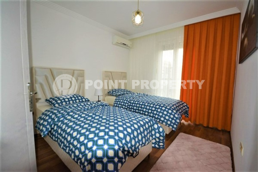 Spacious furnished two-bedroom apartment in the center of Mahmutlar.-id-4133-photo-6