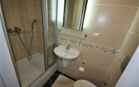 Spacious furnished two-bedroom apartment in the center of Mahmutlar.-id-4133-photo-7