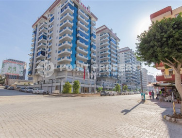 Меблированные двухкомнатные апартаменты 1+1 с площадью 65 м2, Махмутлар-id-4141-фото-2