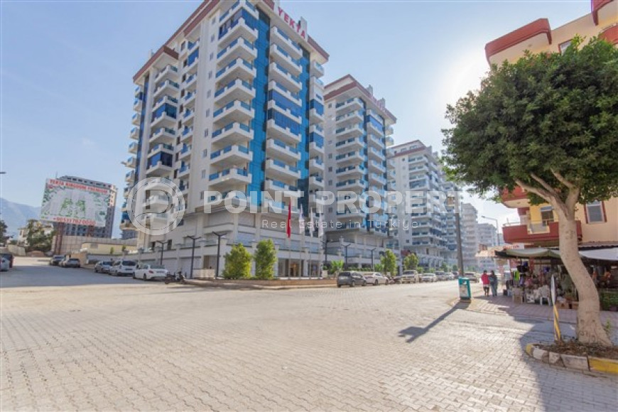 Меблированные двухкомнатные апартаменты 1+1 с площадью 65 м2, Махмутлар-id-4141-фото-2