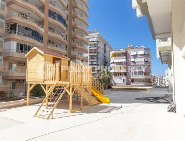 Меблированные двухкомнатные апартаменты 1+1 с площадью 65 м2, Махмутлар-id-4141-фото-4