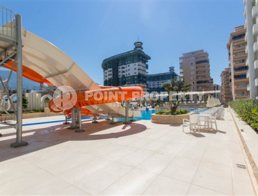 Меблированные двухкомнатные апартаменты 1+1 с площадью 65 м2, Махмутлар-id-4141-фото-5