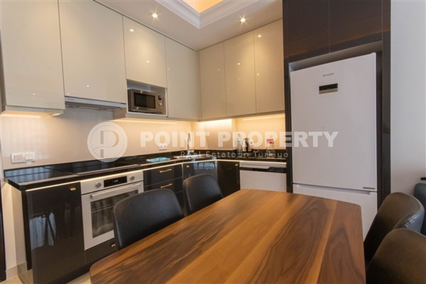 Меблированные двухкомнатные апартаменты 1+1 с площадью 65 м2, Махмутлар-id-4141-фото-16