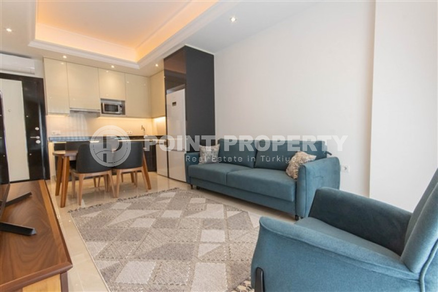 Меблированные двухкомнатные апартаменты 1+1 с площадью 65 м2, Махмутлар-id-4141-фото-17