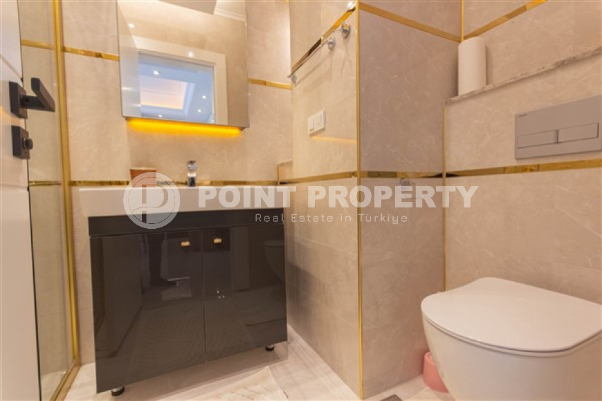 Меблированные двухкомнатные апартаменты 1+1 с площадью 65 м2, Махмутлар-id-4141-фото-18