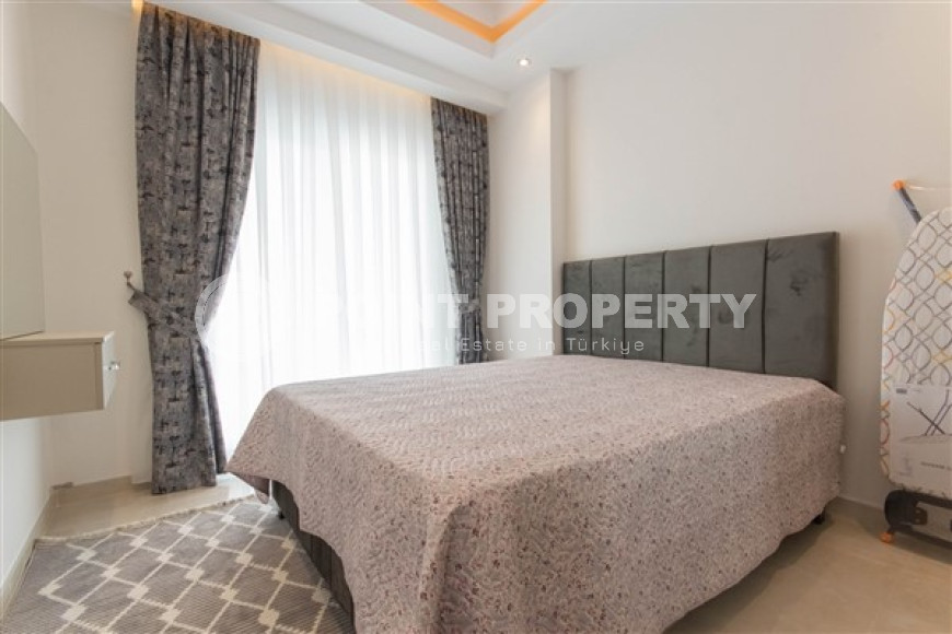 Меблированные двухкомнатные апартаменты 1+1 с площадью 65 м2, Махмутлар-id-4141-фото-19