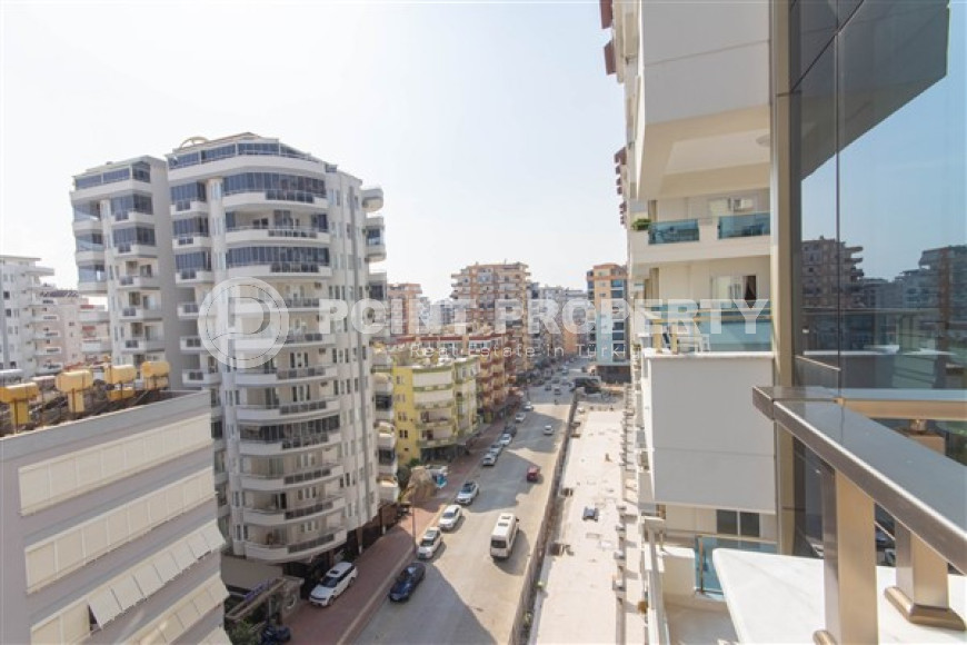 Меблированные двухкомнатные апартаменты 1+1 с площадью 65 м2, Махмутлар-id-4141-фото-21