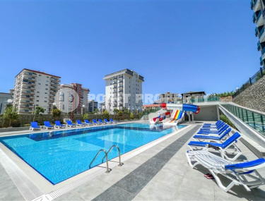 Three-room apartment on the 3rd floor in a new high-rise complex, Mahmutlar district.-id-4153-photo-2