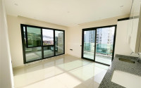 Three-room apartment on the 3rd floor in a new high-rise complex, Mahmutlar district.-id-4153-photo-3