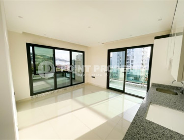 Three-room apartment on the 3rd floor in a new high-rise complex, Mahmutlar district.-id-4153-photo-3