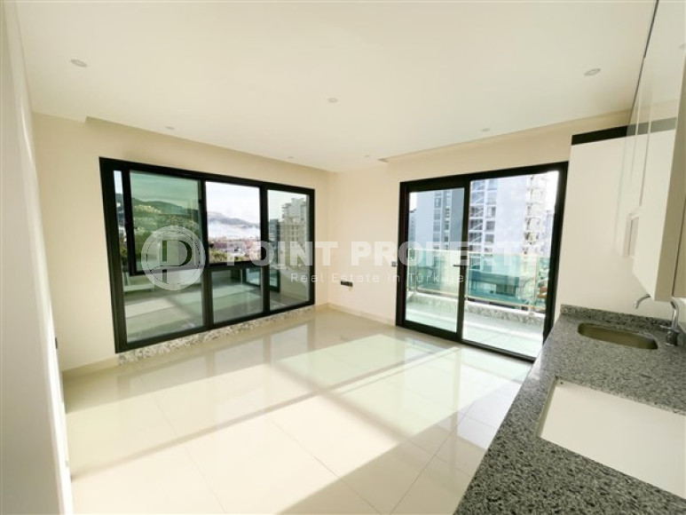 Three-room apartment on the 3rd floor in a new high-rise complex, Mahmutlar district.-id-4153-photo-3