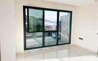 Three-room apartment on the 3rd floor in a new high-rise complex, Mahmutlar district.-id-4153-photo-4