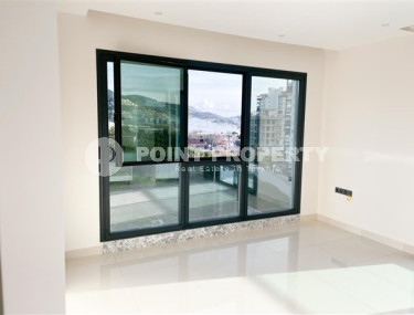 Three-room apartment on the 3rd floor in a new high-rise complex, Mahmutlar district.-id-4153-photo-4