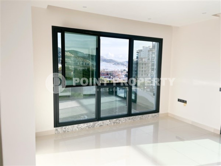 Three-room apartment on the 3rd floor in a new high-rise complex, Mahmutlar district.-id-4153-photo-4