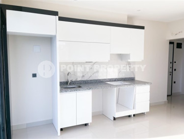 Three-room apartment on the 3rd floor in a new high-rise complex, Mahmutlar district.-id-4153-photo-5