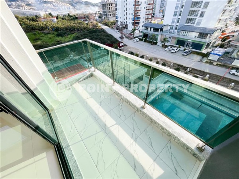 Three-room apartment on the 3rd floor in a new high-rise complex, Mahmutlar district.-id-4153-photo-6