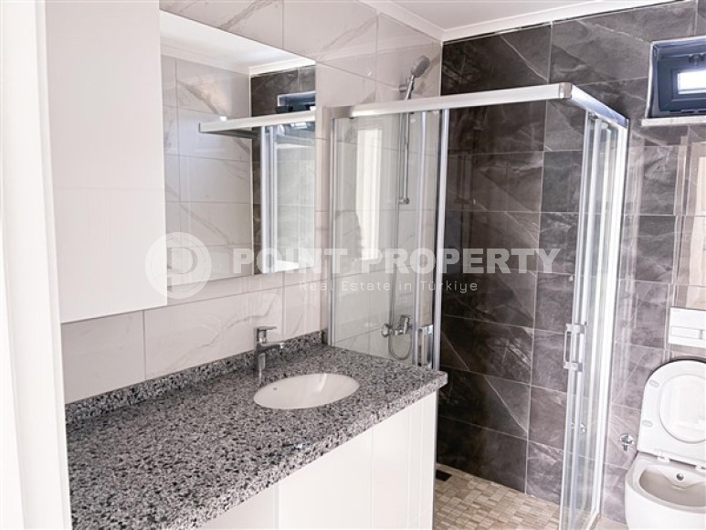 Three-room apartment on the 3rd floor in a new high-rise complex, Mahmutlar district.-id-4153-photo-7