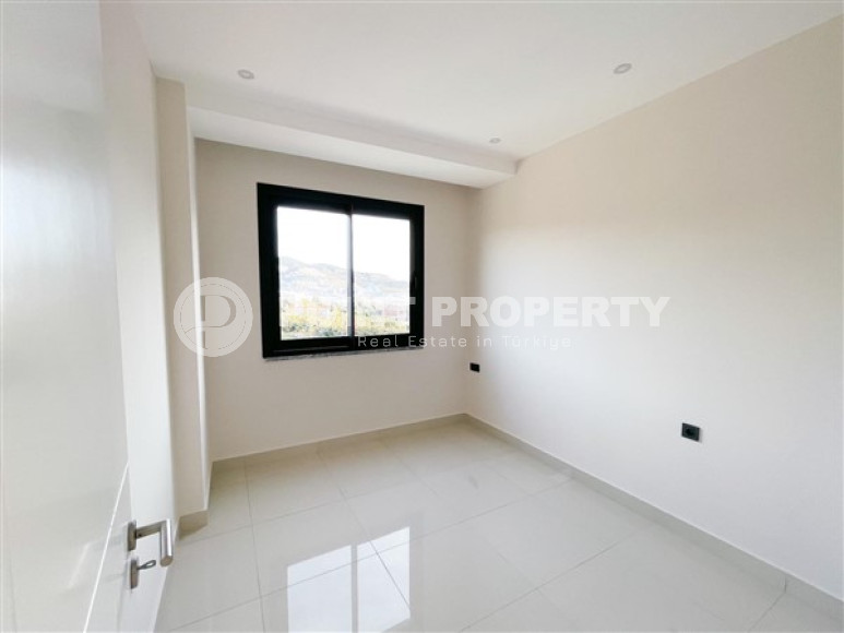 Three-room apartment on the 3rd floor in a new high-rise complex, Mahmutlar district.-id-4153-photo-8